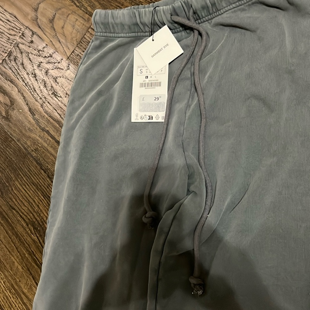 Zara garment dyed sweats w intended rips at knees. Never worn. From UK. SMALL